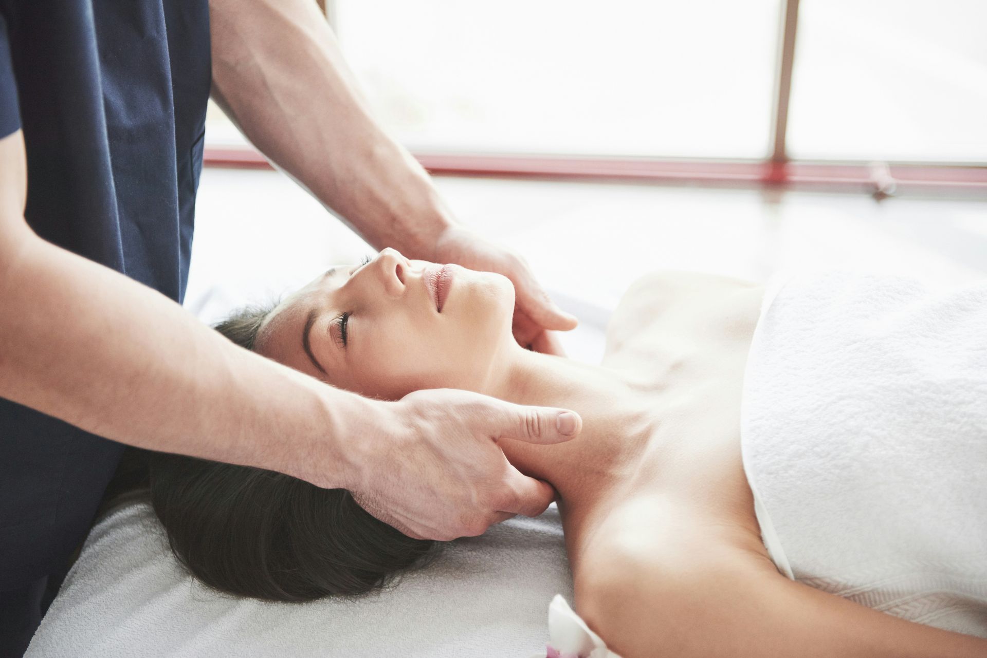 Myofascial release therapist in Las Vegas applying deep tissue pressure.