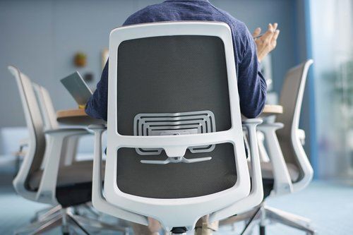 Man Sitting in the Office Chair — Riverside, CA — TotalPlan Business Interiors Inc