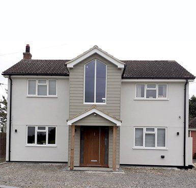 before and after rendered cladding house Quality Render Specialists Basildon