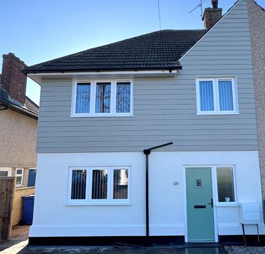 cladding and rendered house by Quality Render Specialists