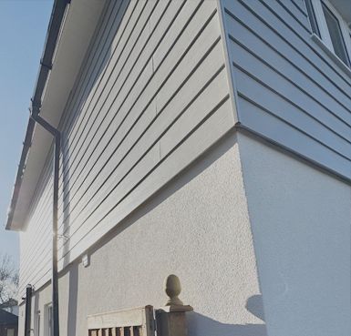 cladding rendered house by Quality Render Specialists