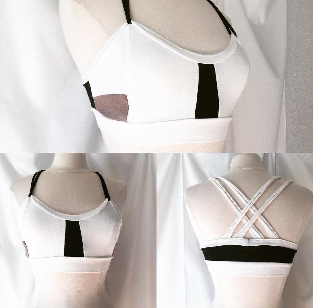 A white bra with black stripes on the front and back