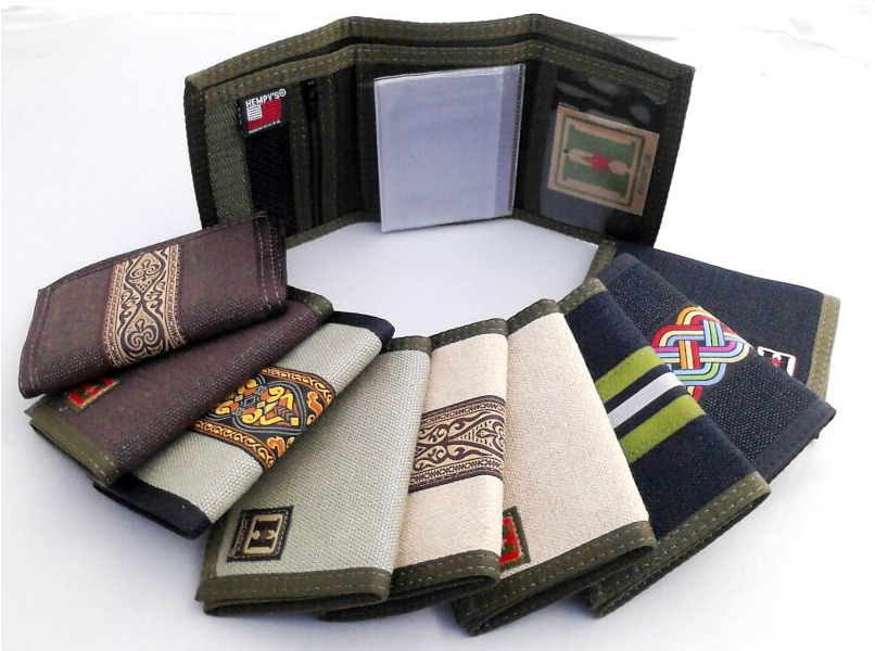 A bunch of wallets are stacked on top of each other