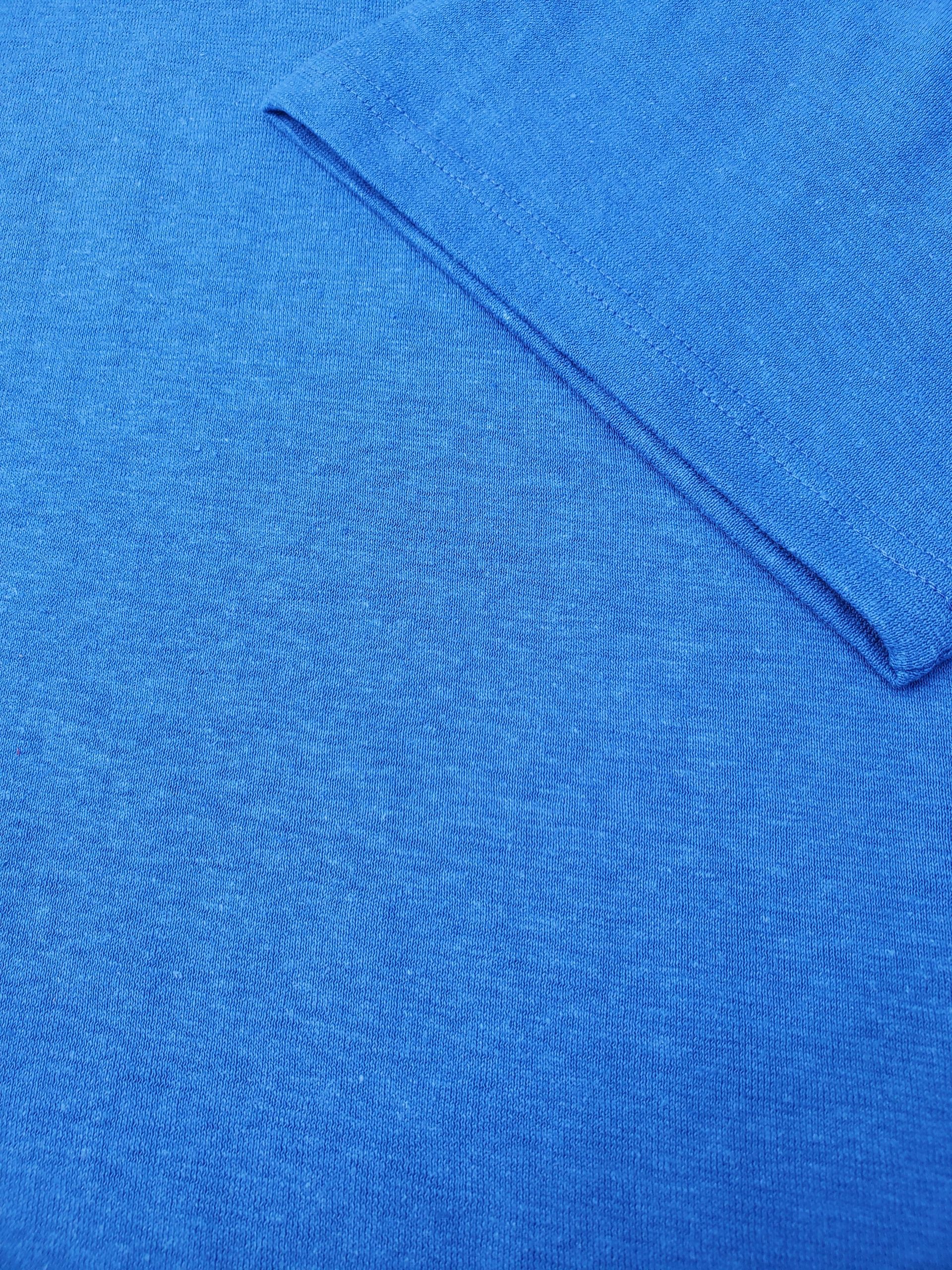 Close up of blue hemp t-shirt and sleeve