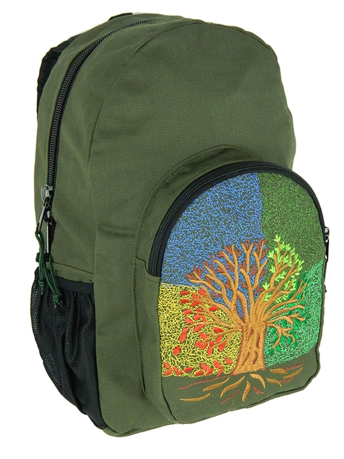 A green backpack with a tree embroidered on it