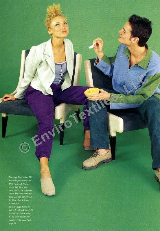 A man and a woman are sitting on a bench with envirotextiles written on the bottom