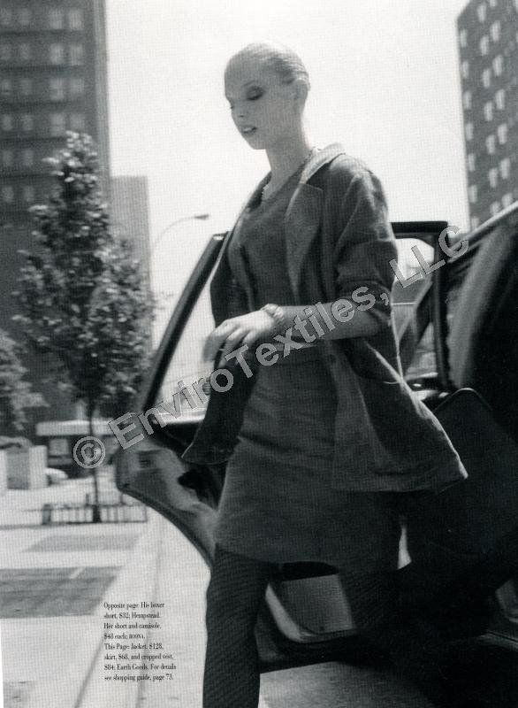A black and white photo of a woman getting out of a car