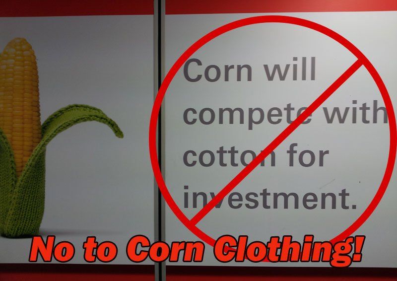 A sign that says corn will compete with cotton for investment