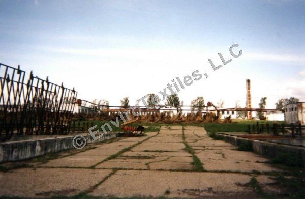 A photo of an abandoned factory taken by environment textiles llc