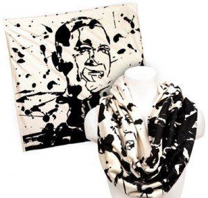 A black and white scarf with a picture of a man on it