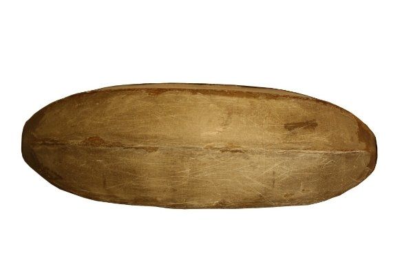 A brown oval shaped object on a white background