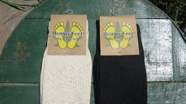 Two pairs of socks with labels that say mummy 's feet