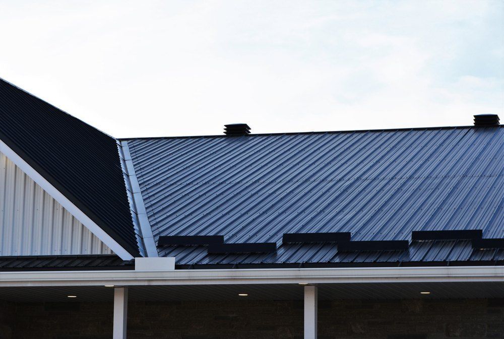 A snapshot of a side of a black roof— Rhythm Roofing in Kempsey, NSW