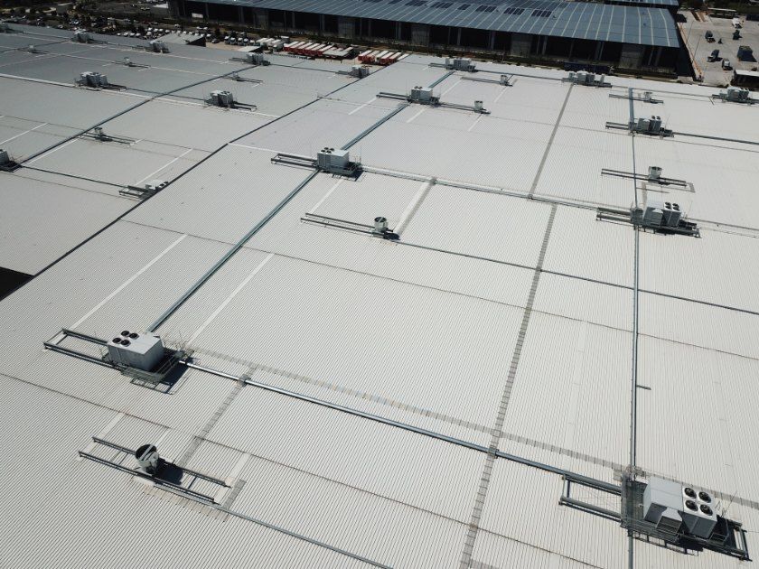 An Aerial View of the Roof of a Building — Rhythm Roofing in North Boambee Valley, NSW