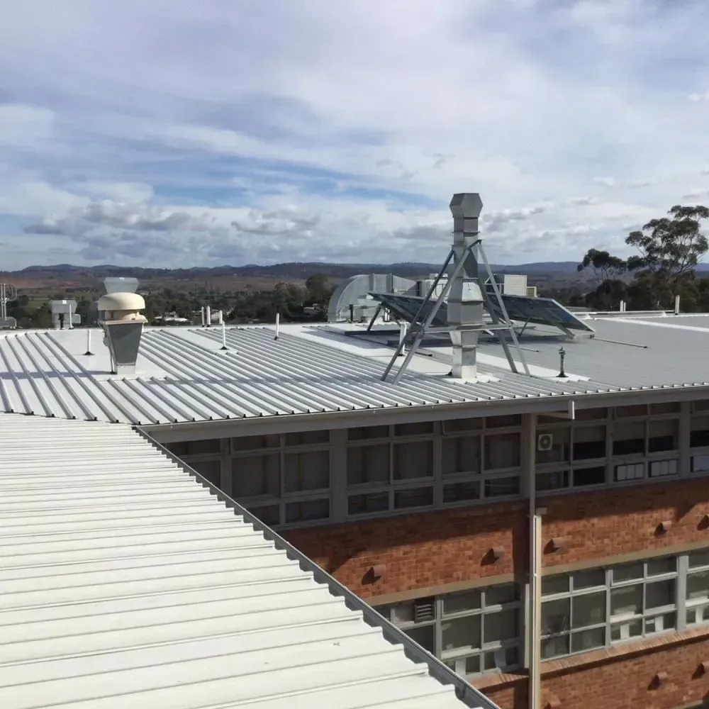 Industrial and Commercial Re-roofing and Restoration Services — Rhythm Roofing in North Boambee Valley, NSW