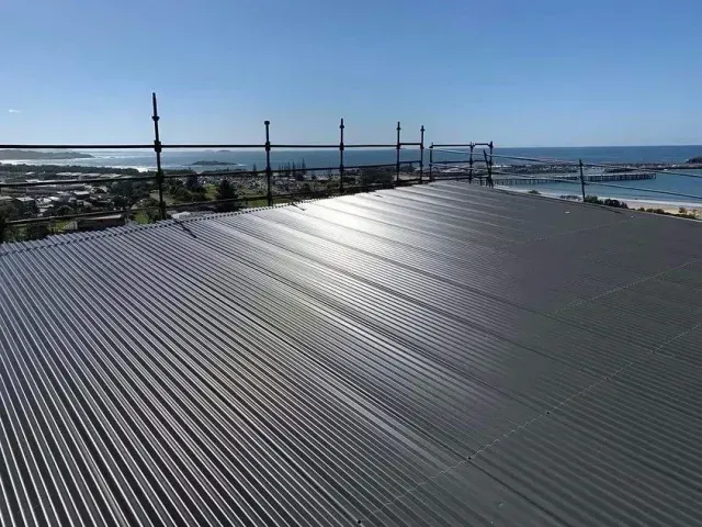 The Roof of a Building With a View of the Ocean — Rhythm Roofing in North Boambee Valley, NSW