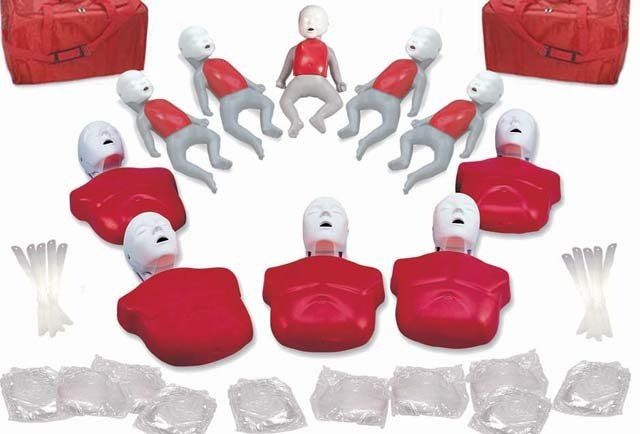 A group of red mannequins are sitting in a circle