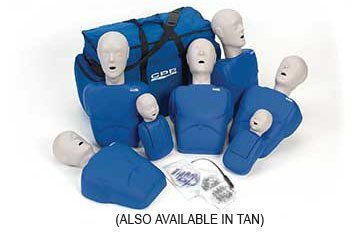 A group of mannequins are sitting next to each other on a table.