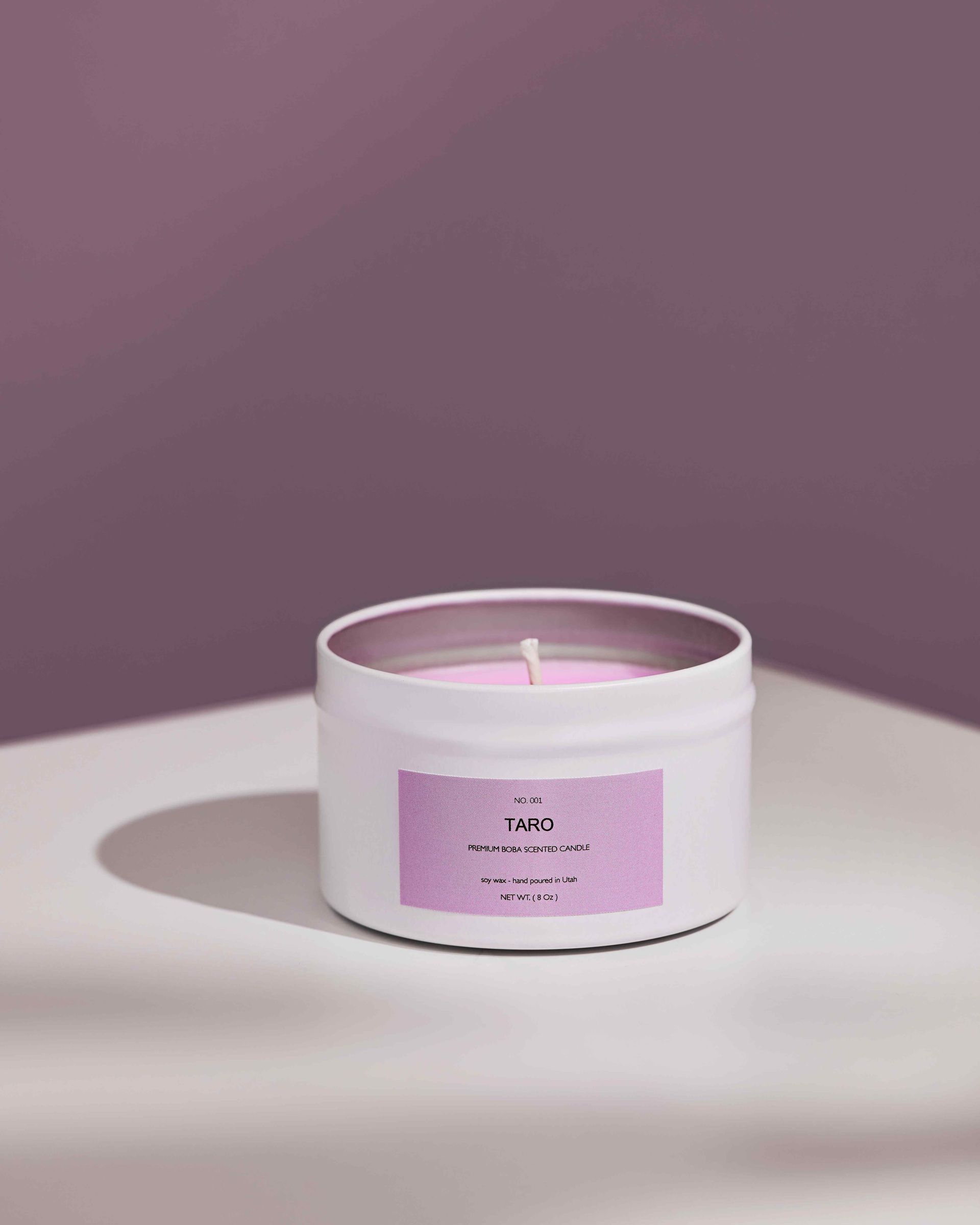 Taro scented BobaLuv candle lit