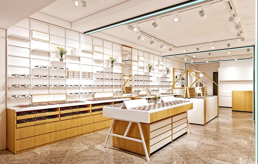 Persona che collega un dispositivo su una superficie bianca, con gli attrezzi in una cassetta degli attrezzi aperta nelle vicinanze.