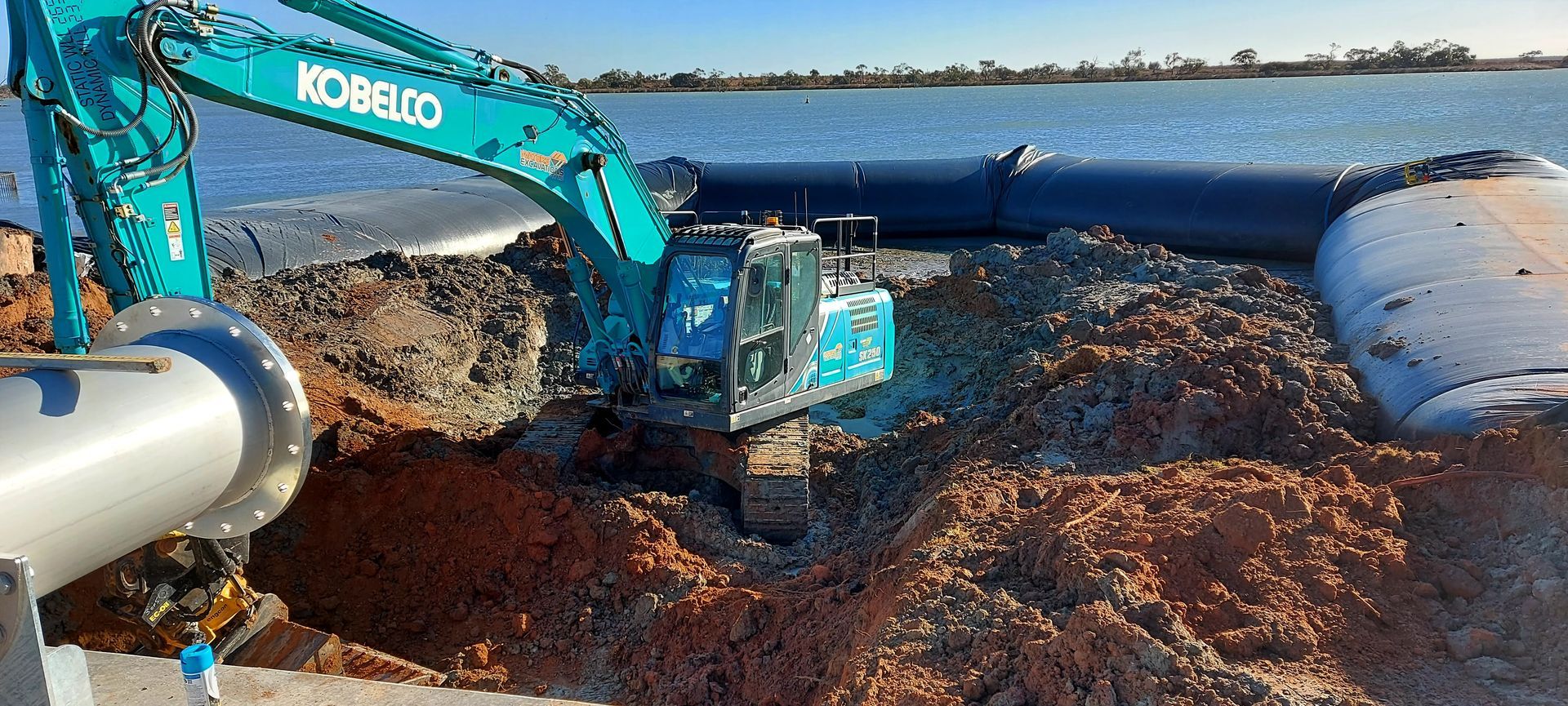 Another View of A Excavator Digging Near a Pipeline— Mildura, Vic — Waters Excavations Pty Ltd