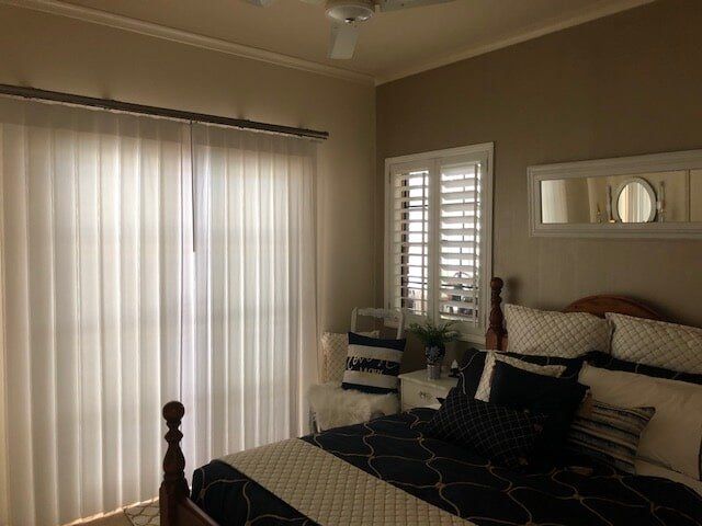 internal aluminium blinds in a bedroom