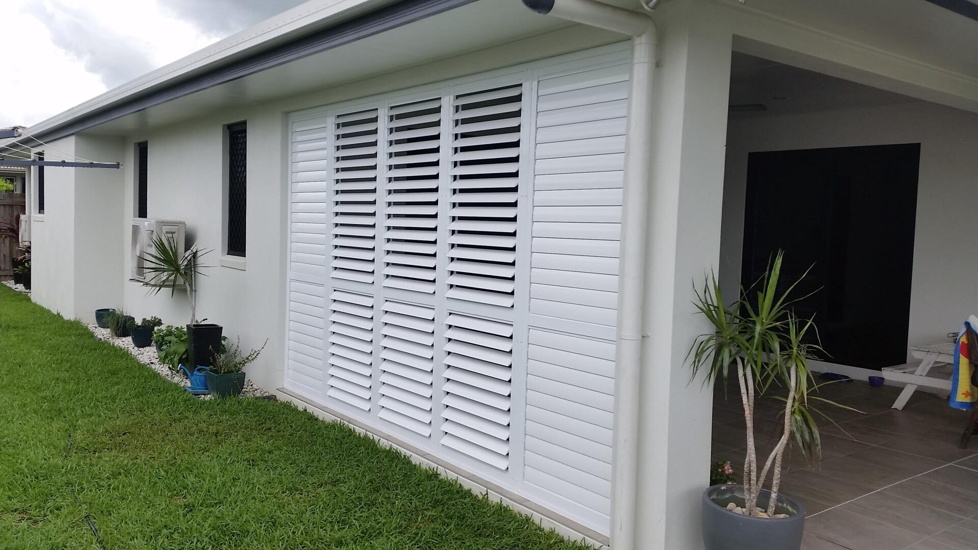closed external aluminium shutters on enclosed patio 4