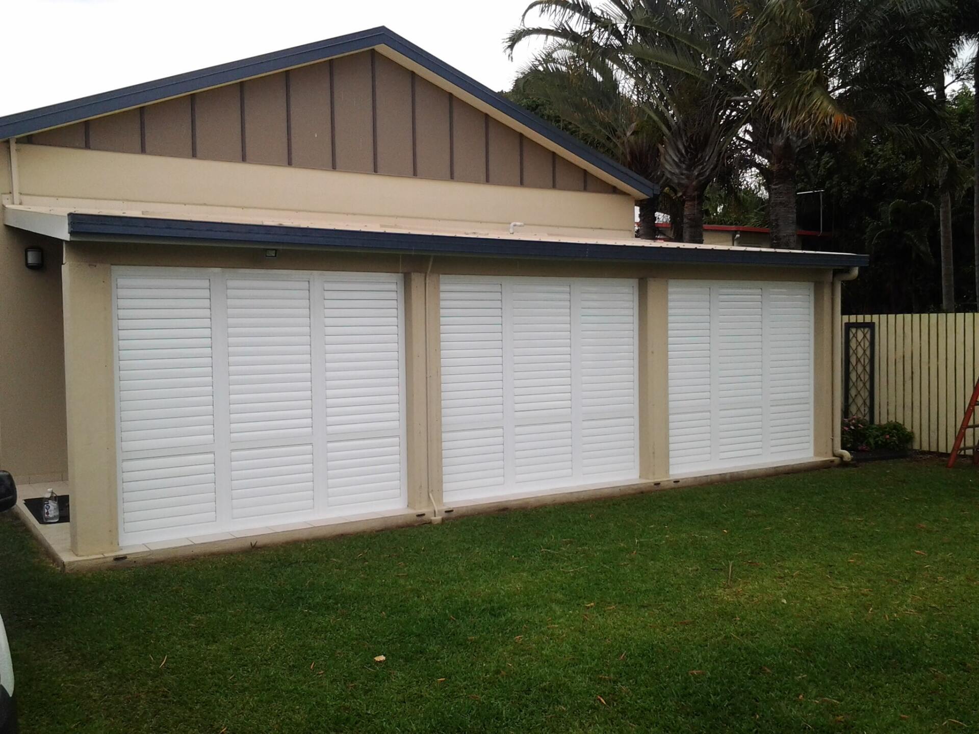 closed external aluminium shutters on enclosed patio 2