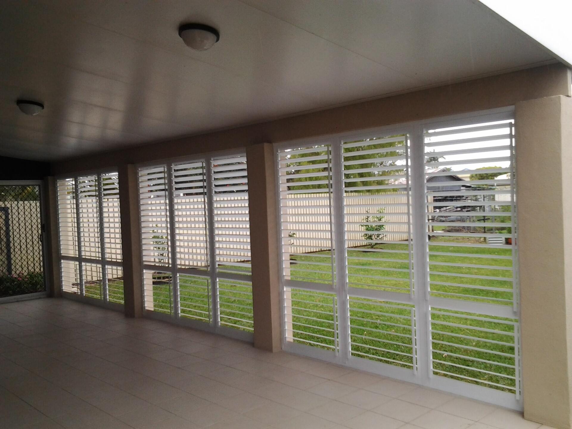 closed external aluminium shutters on enclosed patio 5