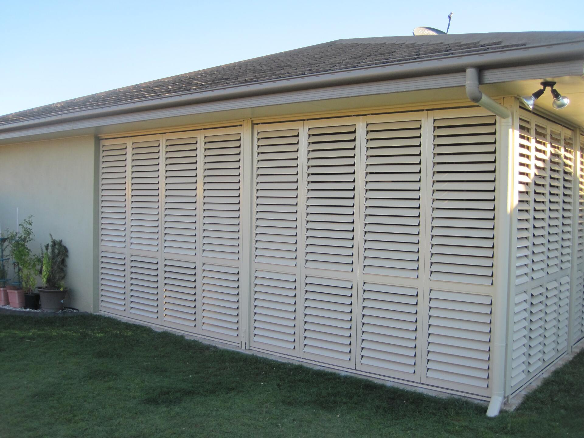 closed external aluminium shutters on enclosed patio 3
