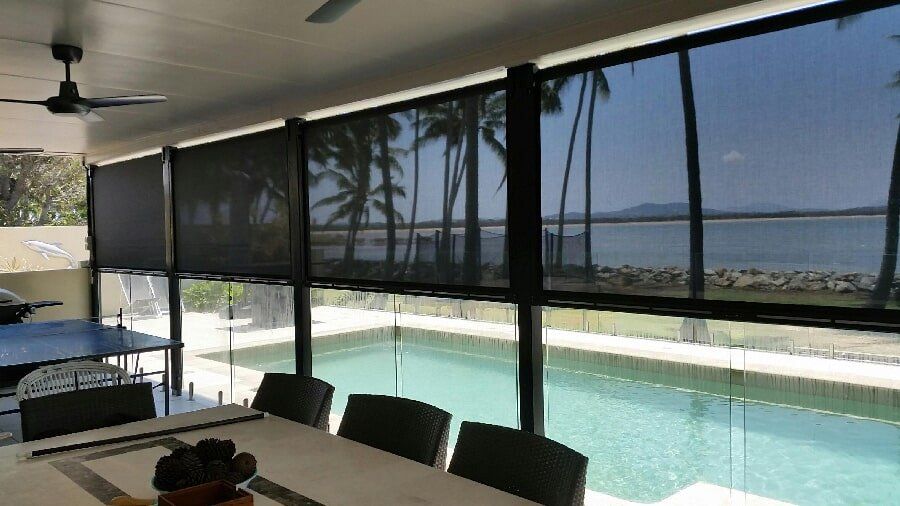 Ziptrak Installed in outdoor dinning area — Fabric Awnings in Mackay