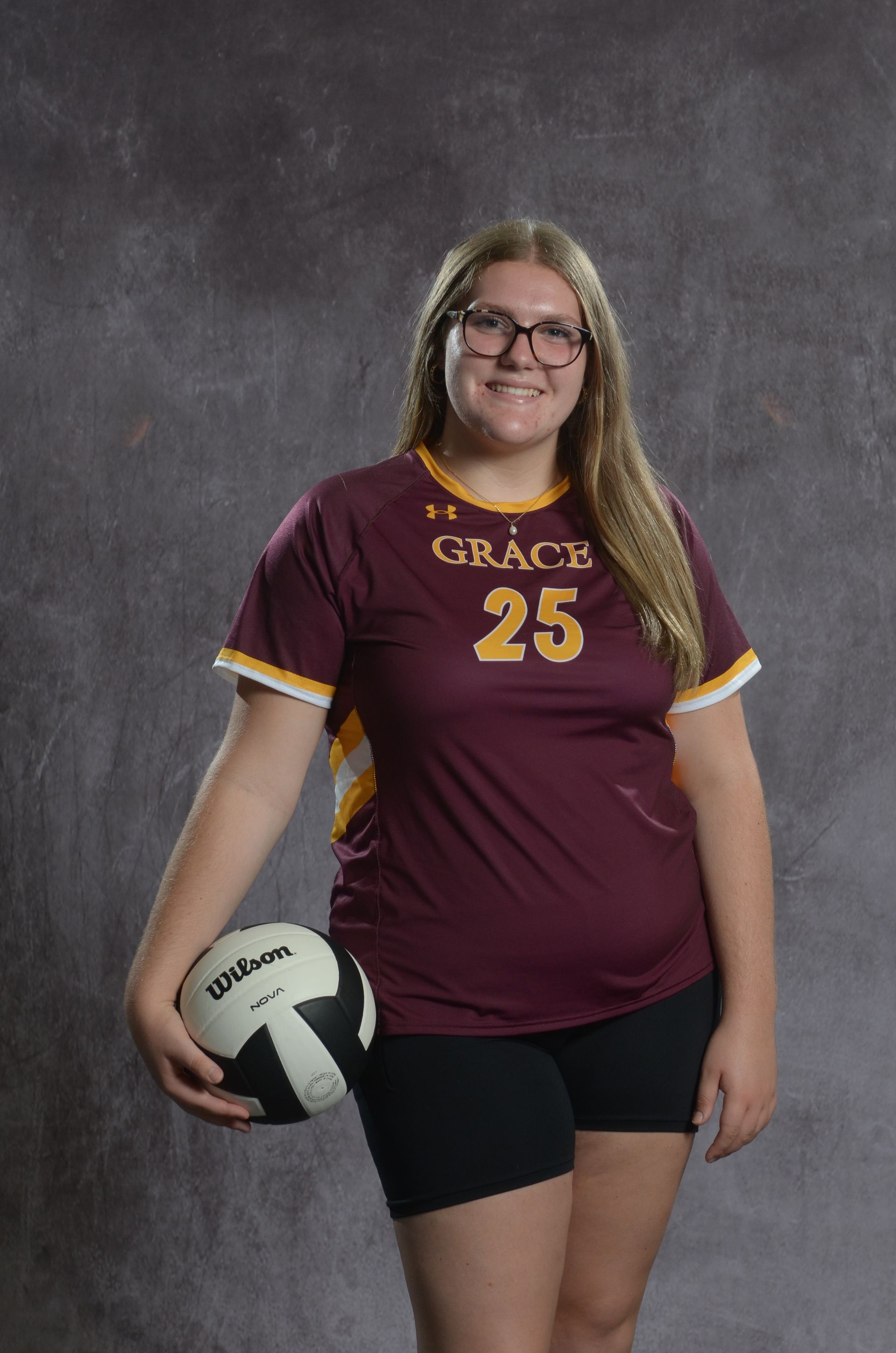 Eagle head logo, maroon and gold.