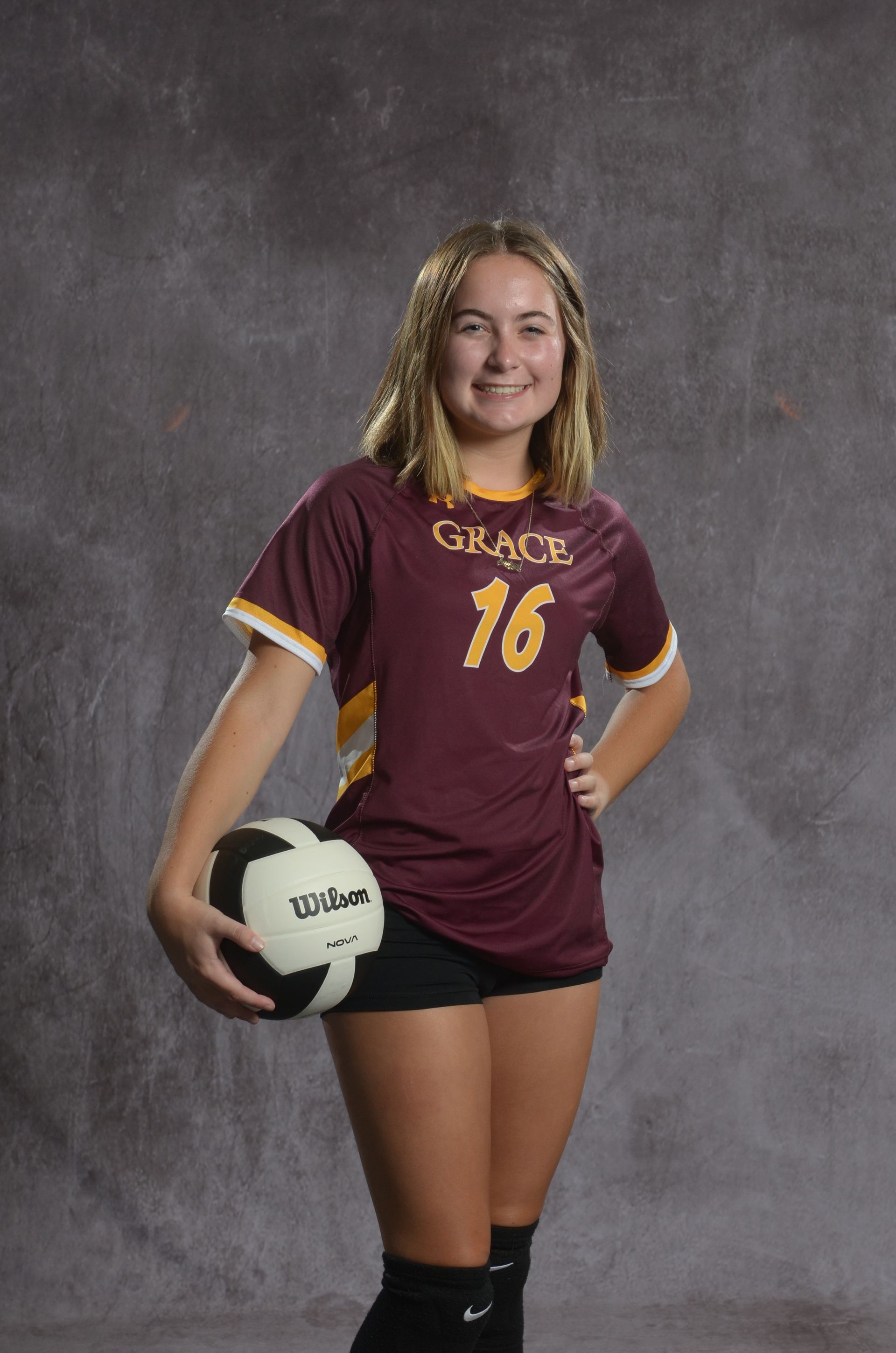 Eagle head logo, maroon and gold.