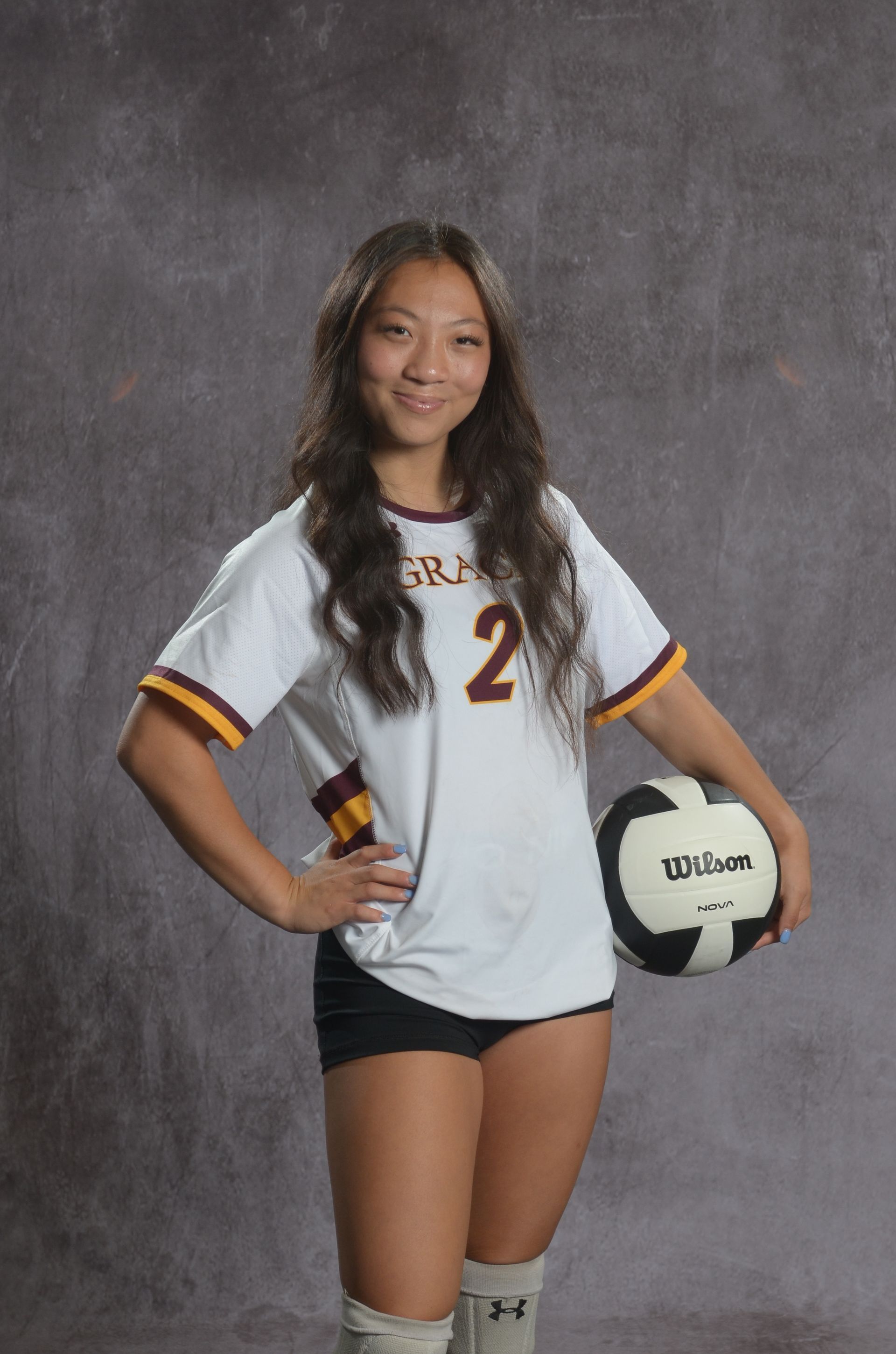 Eagle head logo, maroon and gold.