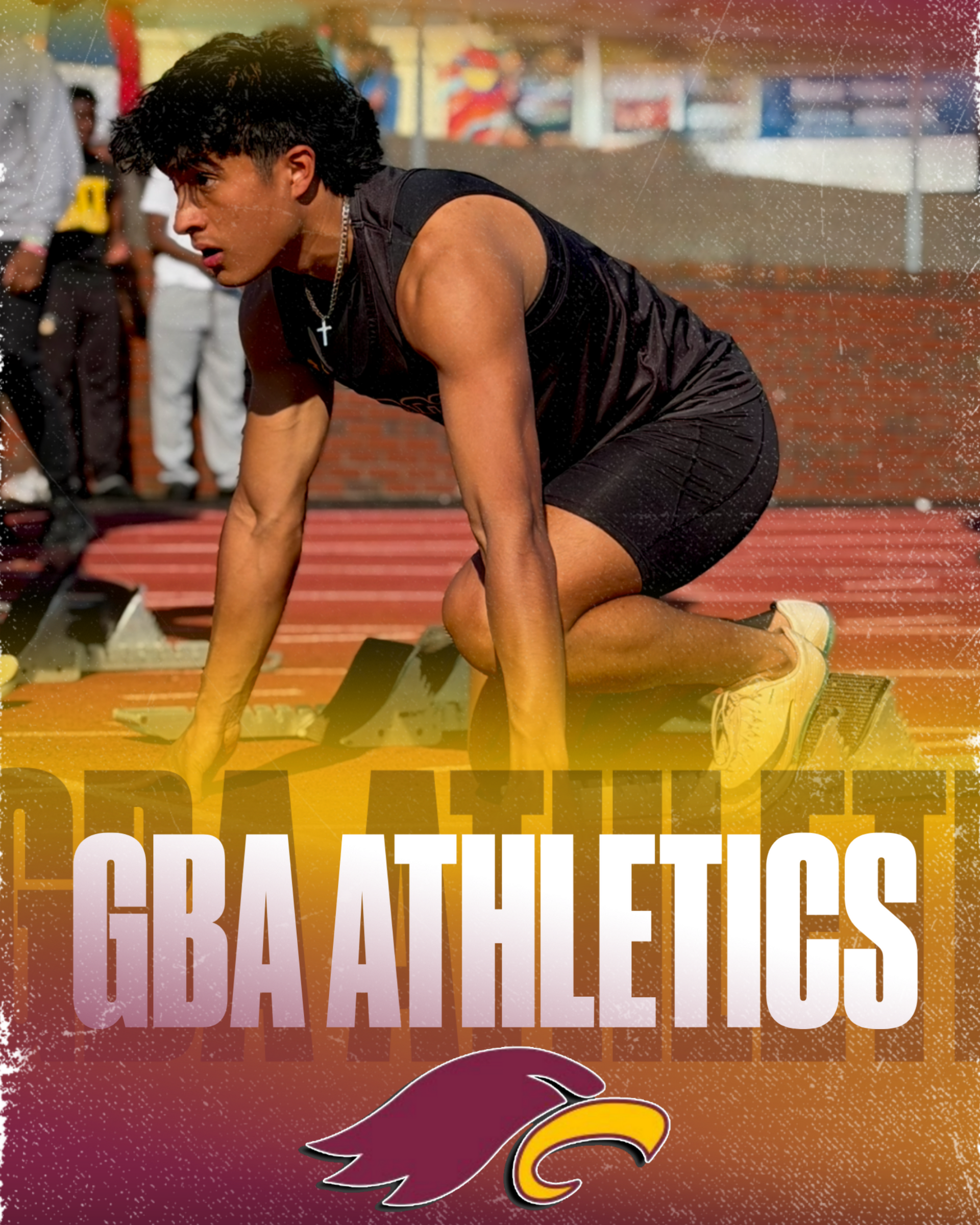 A girls' soccer team in maroon uniforms kneels on a grassy field with their coach.