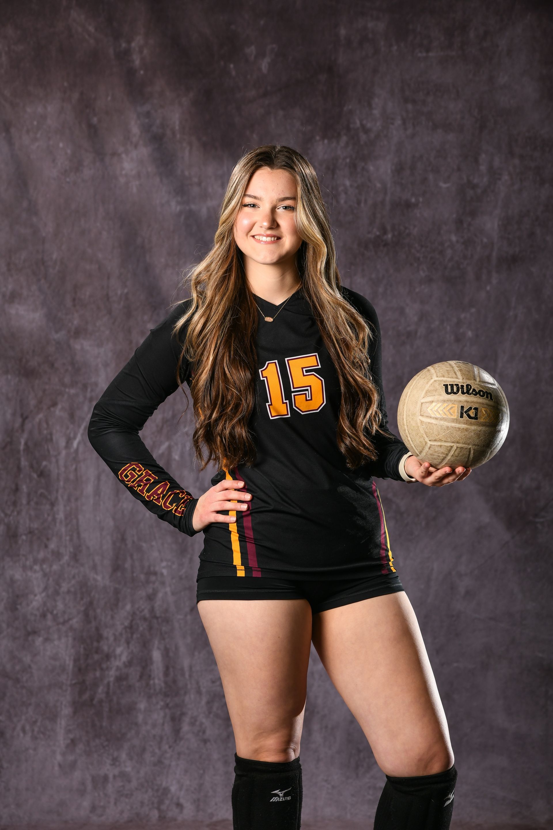 Eagle head logo, maroon and gold.