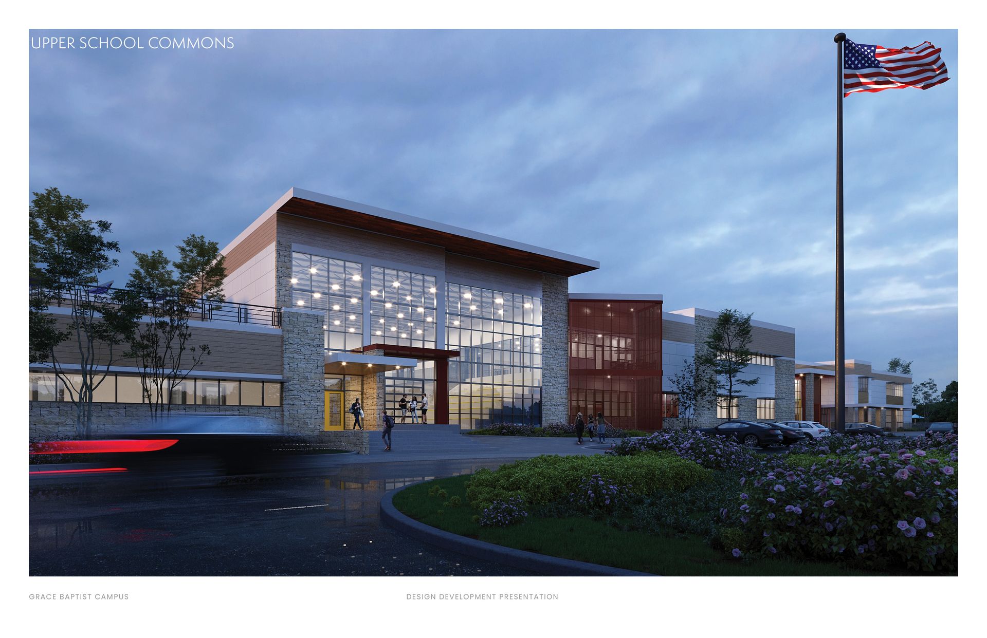 Modern building with glass facade and an American flag waving against a cloudy sky.