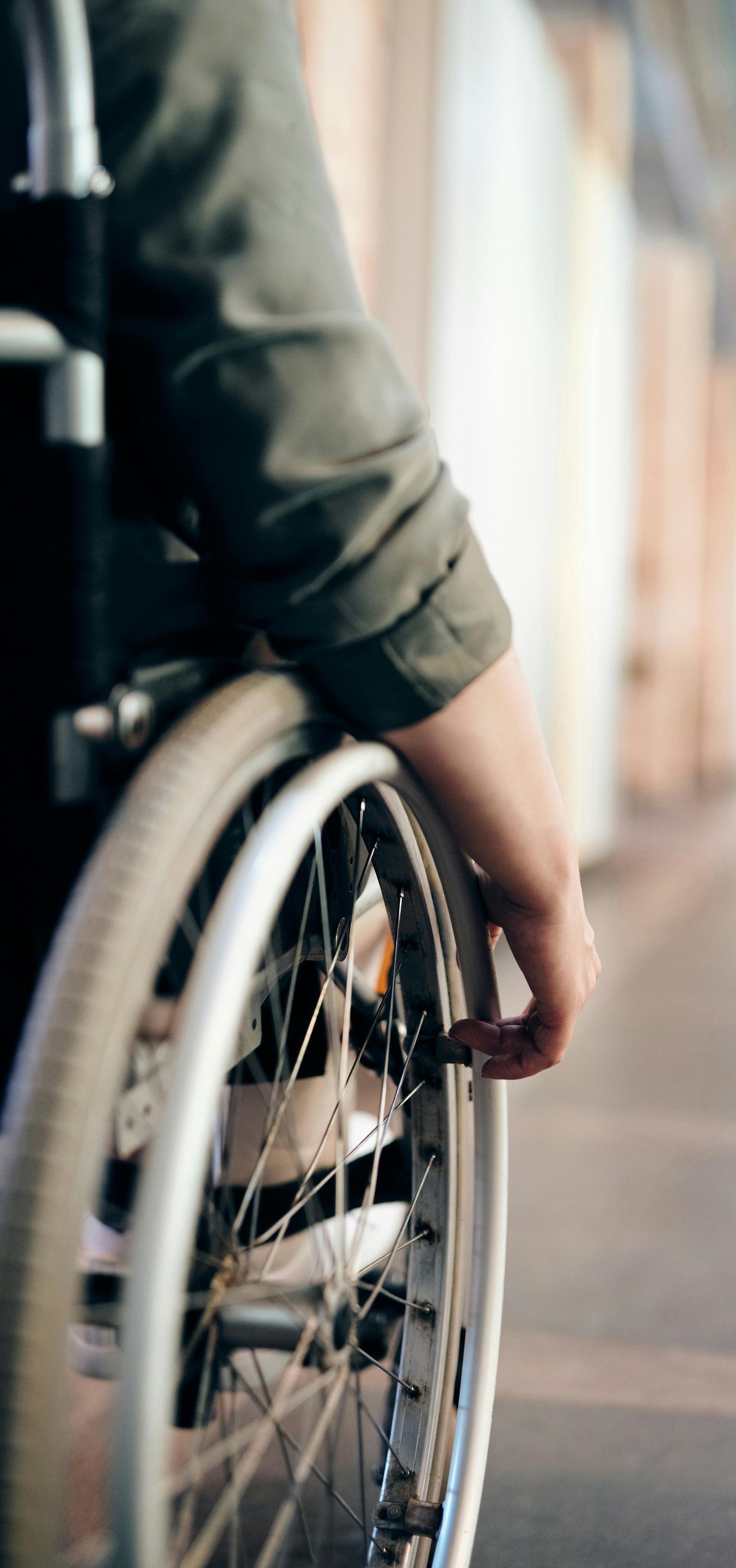 A close up of a person in a wheelchair.