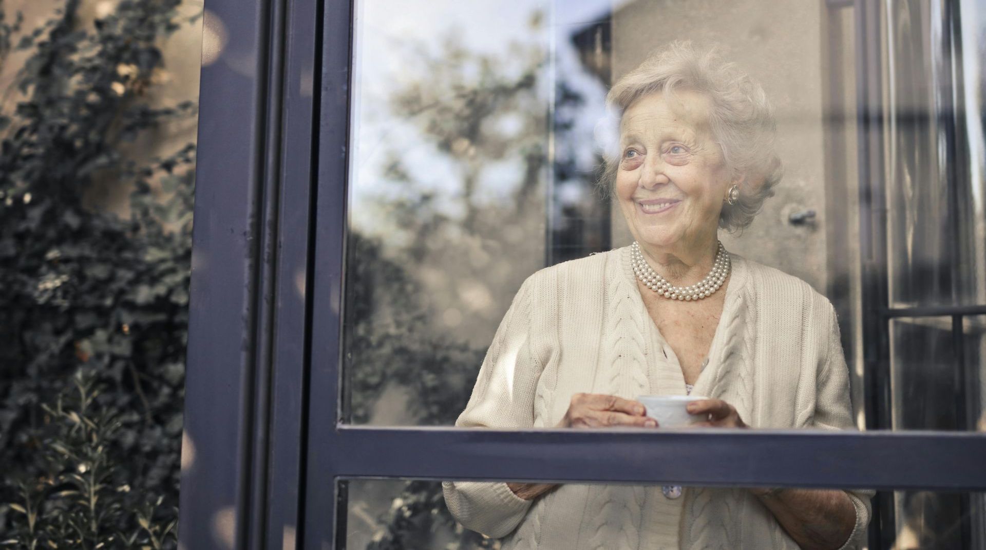 old woman at window