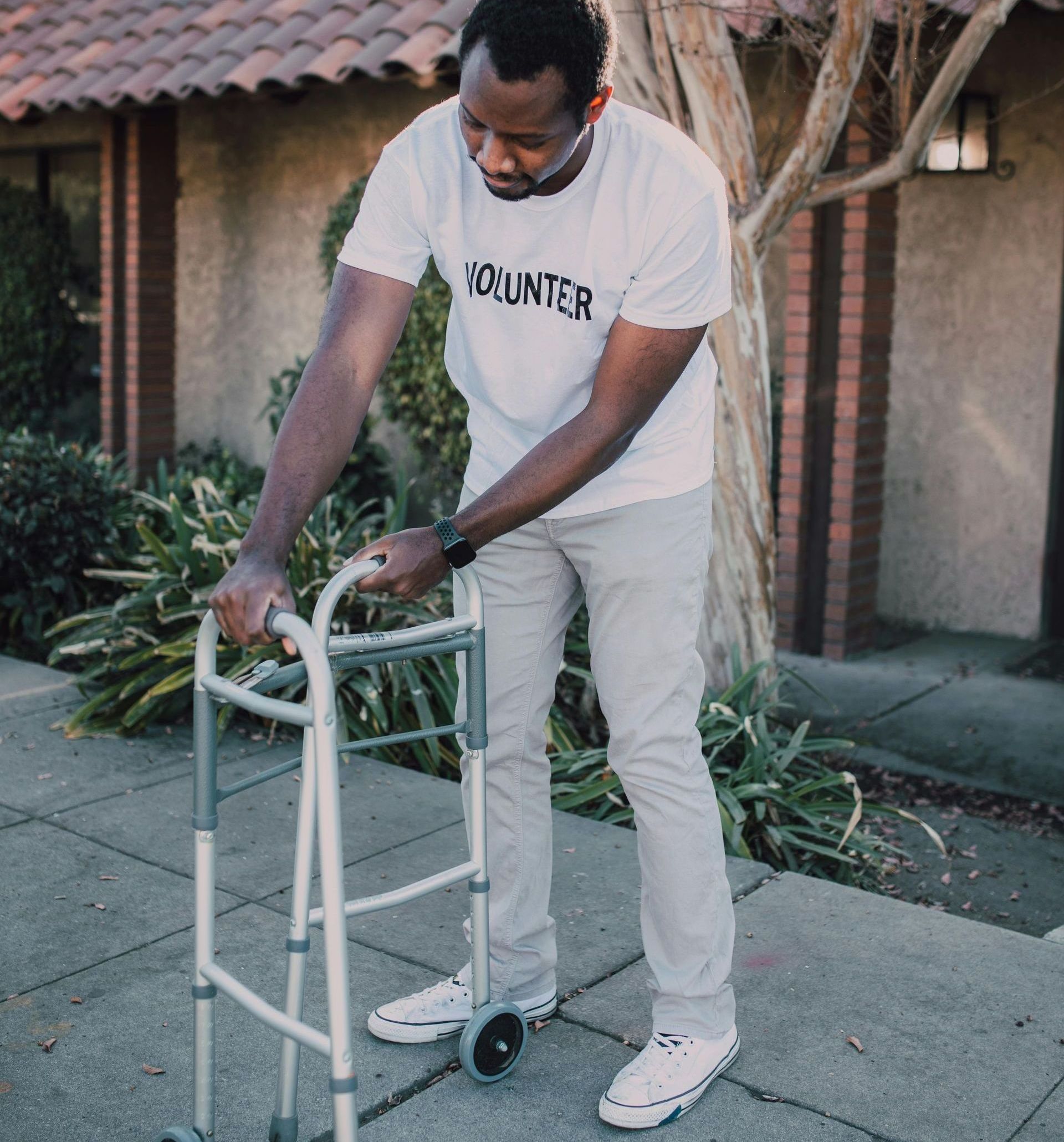 a man folding up a walker