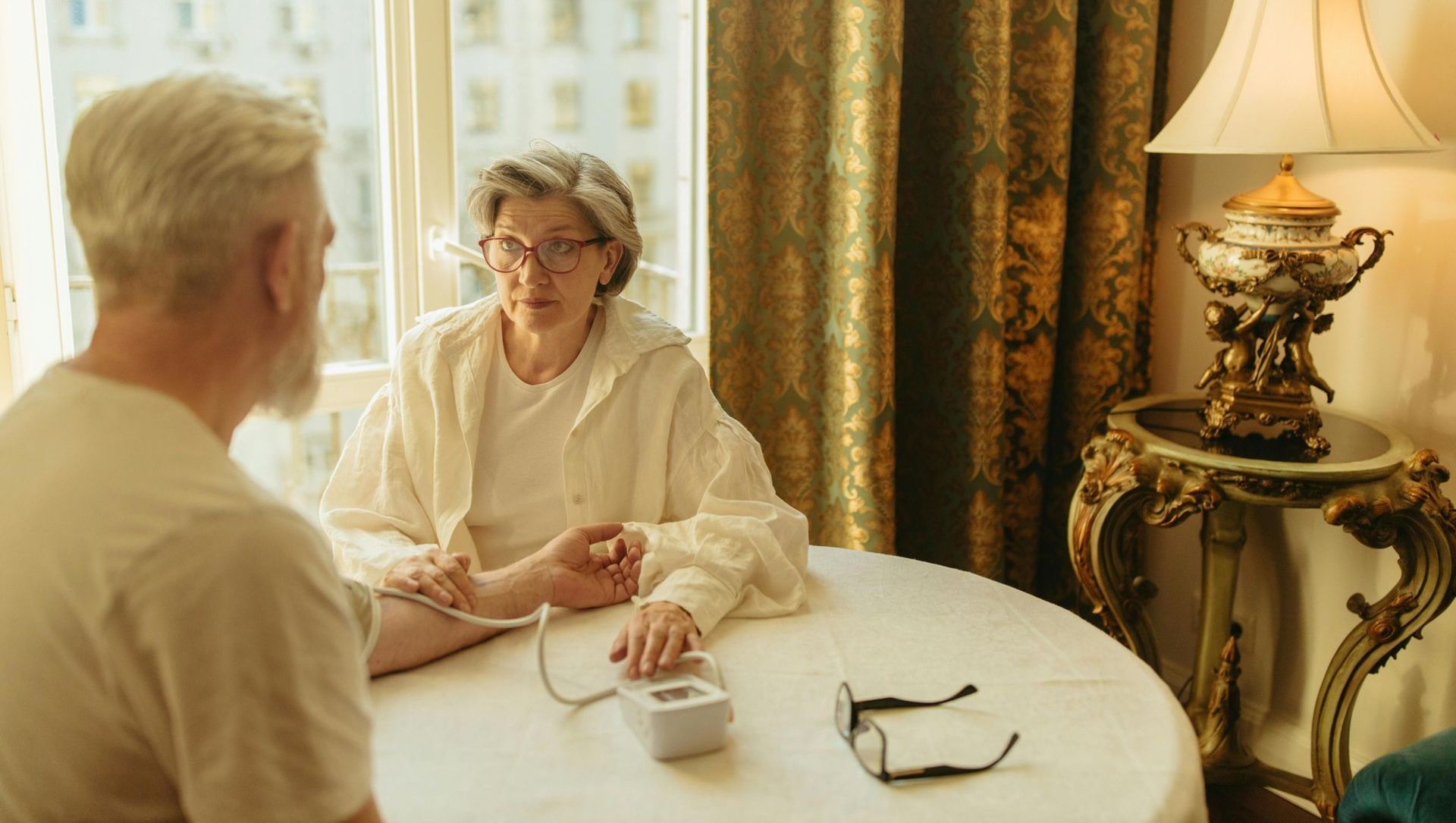 woman taking blood pressure