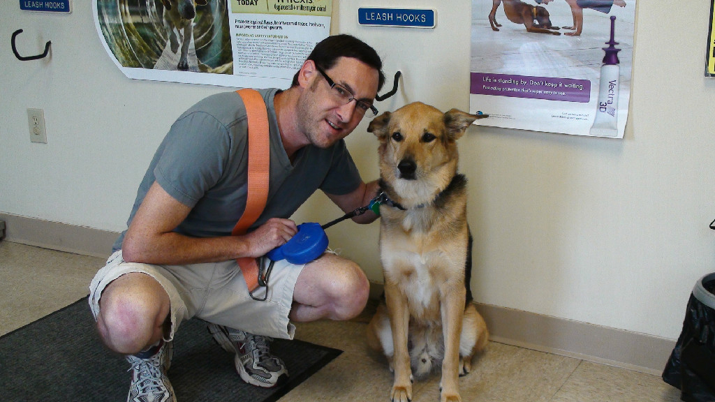 Pet Owner and His Dog — Elyria, OH — Elyria Animal Hospital