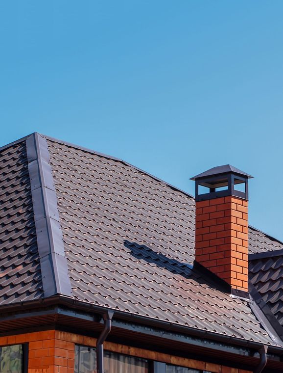 House With Chimney And Gutter — Douglasville, GA — Tippens Gutter Services