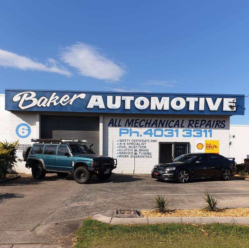 Two Cars Are Parked In Front Of Baker Automotive All Mechanical Repairs — Baker Automotive In Bungalow, QLD