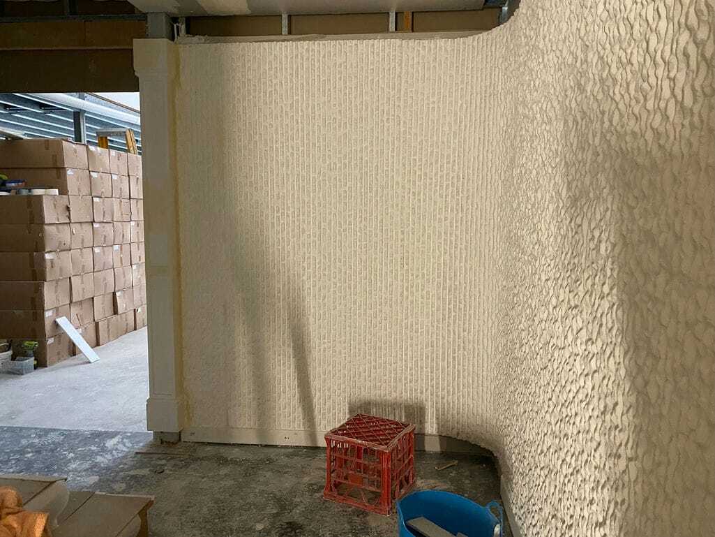 Curved Stone Look Wall — Custom Cornices in Logan Village, QLD