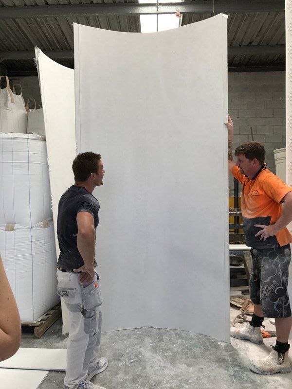 Workers Working on Custom Columns — Manufacturing Cornices in Logan Village, QLD