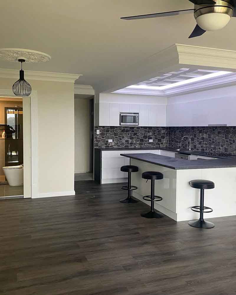 Kitchen with chairs — Manufacturing Cornices in Logan Village, QLD