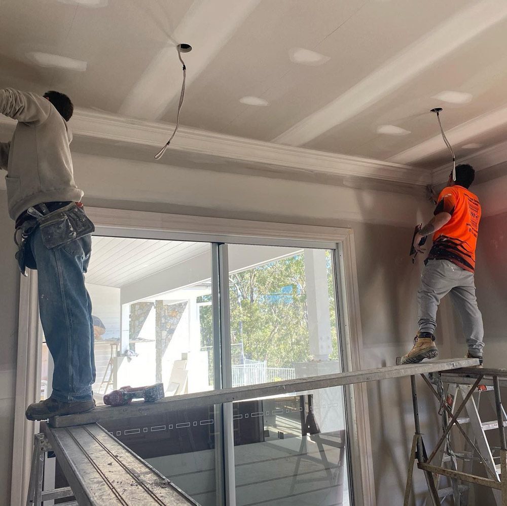 Team working on site — Manufacturing Cornices in Logan Village, QLD