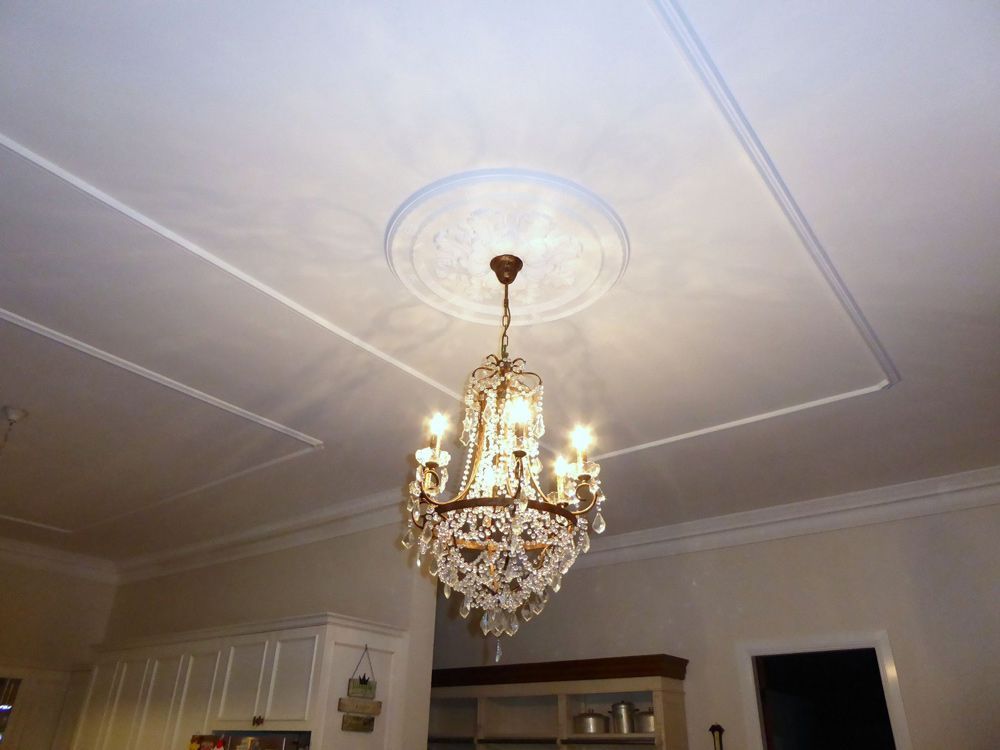 Chandelier hanging in the ceiling — Manufacturing Cornices in Logan Village, QLD