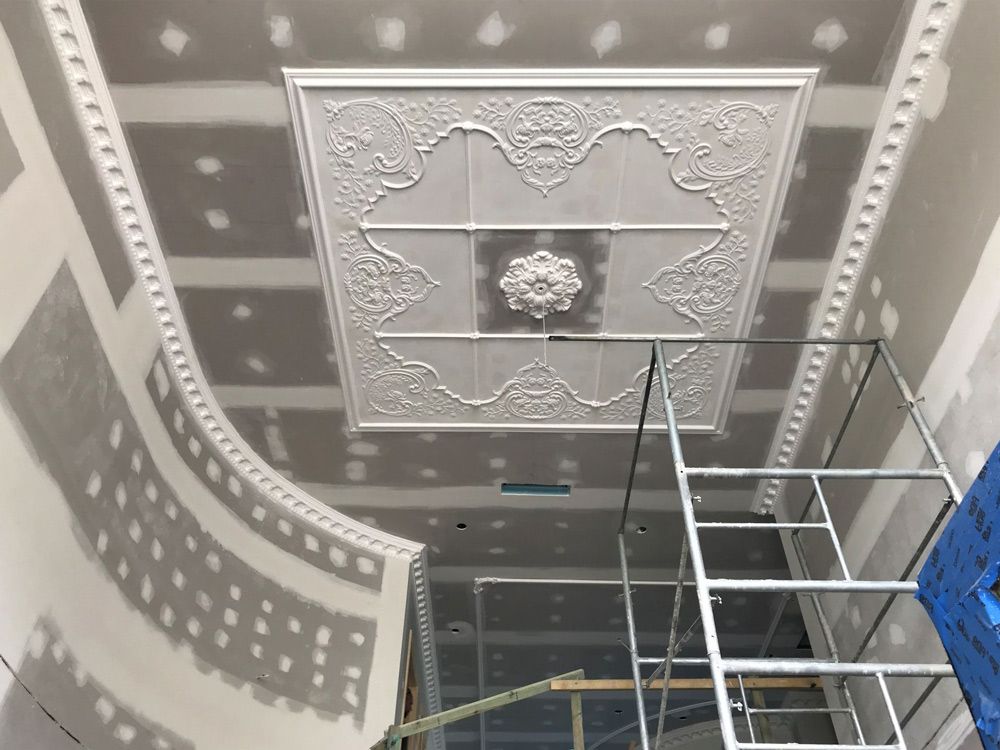 Working on Decorative Ceiling — Manufacturing Cornices in Logan Village, QLD